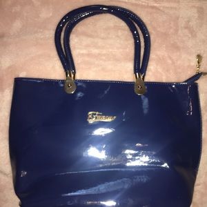 Blue patent handbag